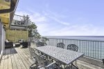 Upper level balcony with outdoor eating and lounge areas